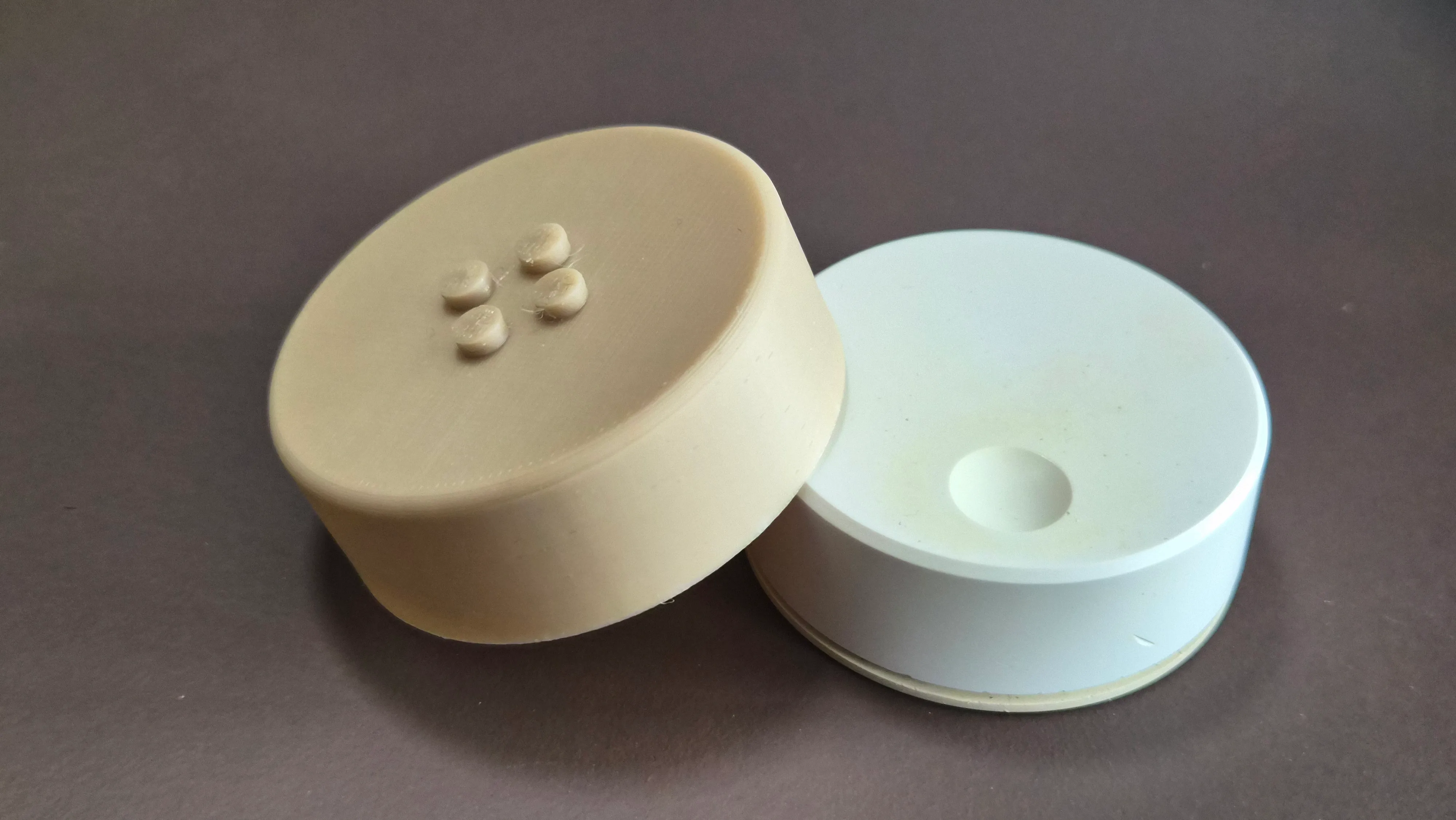 One stud has a media control knob for quick access to volume and play/pause.