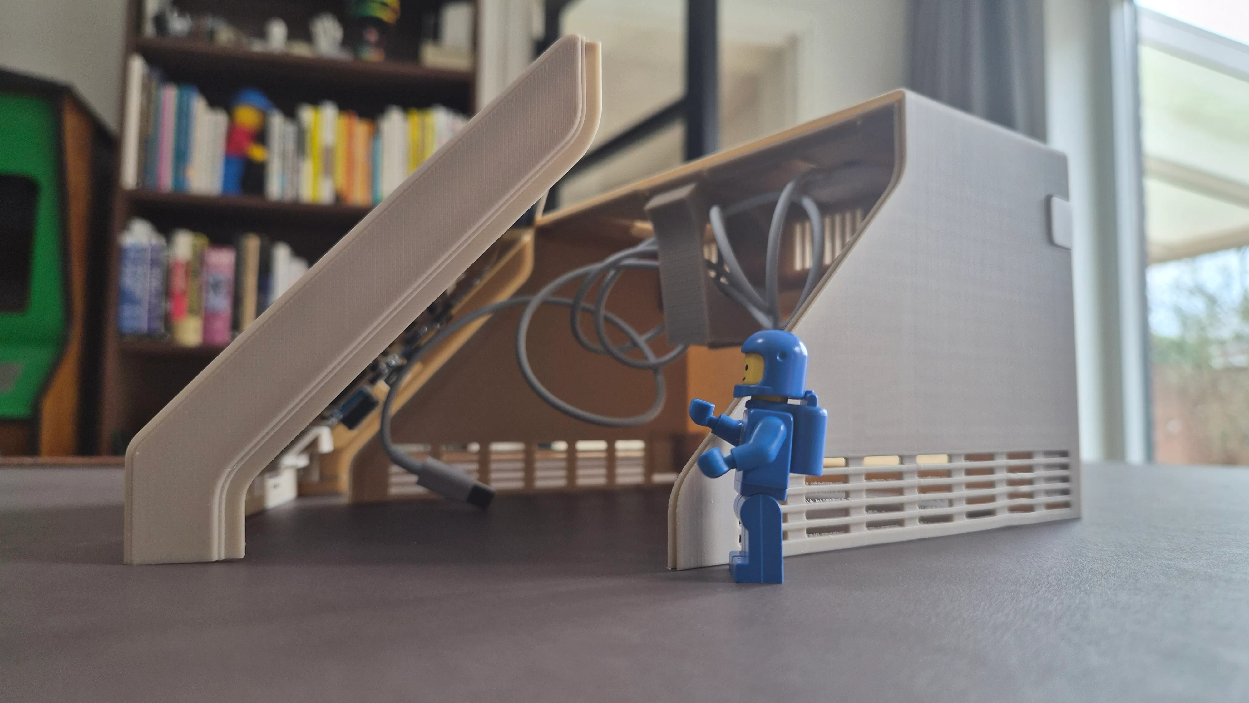 Slide the front of the case into the slots of the main body (friction-fit).